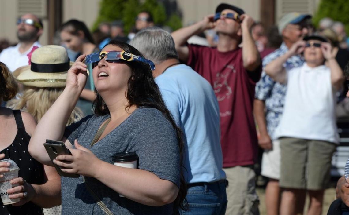 Police estimated 1,600 people gathered in a field next to the Ferndale Boys & Girls Club to watch a partial eclipse of the sun Monday morning, Aug. 21, 2017.