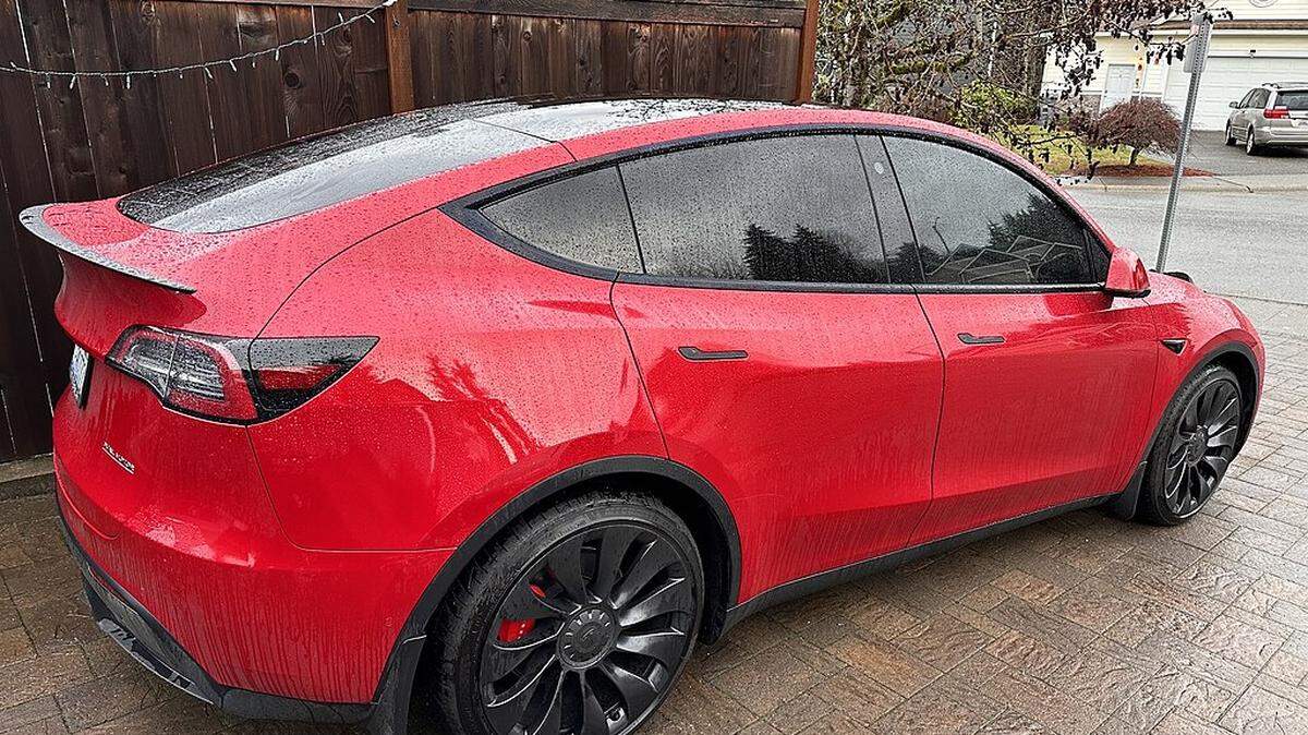 A Tesla Y with windows tinted at 20% all around.