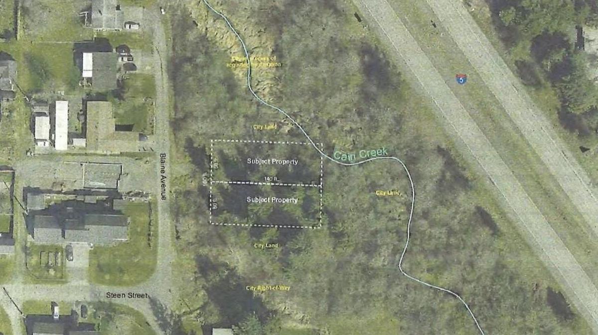 These two lots will be purchased by the City of Blaine to be transformed into part of the Cain Creek Park.