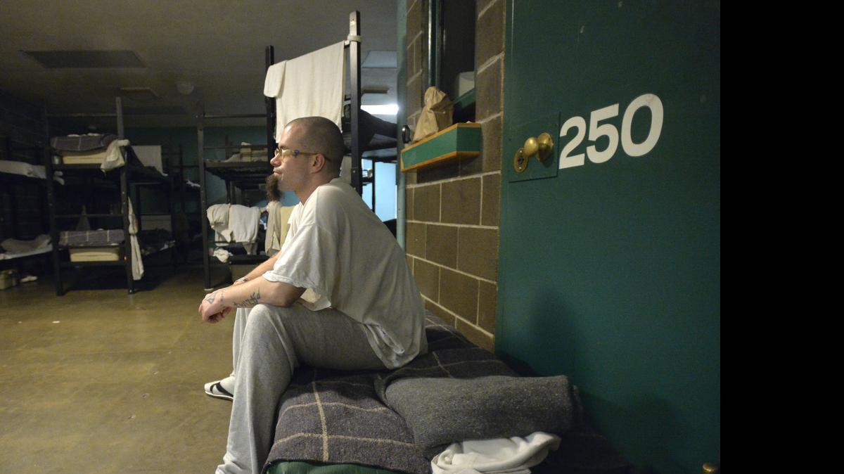 
Inmate Chris Mayse watches TV after getting off the night shift as a trustee at the Whatcom County Jail Thursday, March 26, 2015, in Bellingham. The trustee's room has the only TV in the jail.
