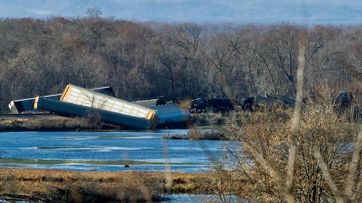 Cars of a BNSF Railway train lie in a jumbled pile after derailing Saturday, Nov. 7, 2015, just north of Alma, Wis. About 20,000 gallons of ethanol was spilled. An oil train derailed on Sunday in Watertown, Wis., on Canadian Pacific track, spilling 1,000 gallons.