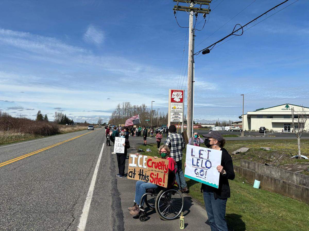 People protested near a reported ICE facility in Ferndale following the detention of activist Lelo Juarez on March 25, 2025.