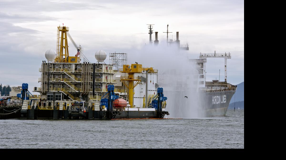
Crews from Superior Energy Services test water pump systems aboard the Arctic Challenger on Friday, Aug. 29, 2014 in Bellingham. The ship was built for Shell offshore drilling operations in the Alaskan Arctic.
