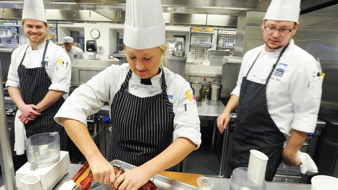 Culinary students Ben Garding, left, Anastasia Lagutochkin and Colin Colin Reed practice making their competition dishes at Bellingham Technical College, Friday, Feb. 27, 2015.