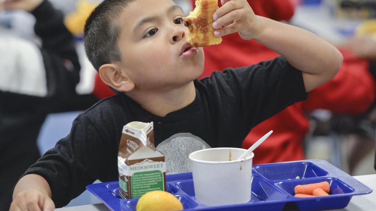 
Alderwood Elementary kindergartener Johnny Gaona, 5, enjoys cornbread made locally by Avenue Bread dipped in homemade chili during lunch on Taste Washington Day, Wednesday, Oct. 7, 2015 in Bellingham. The three-bean chili was made with beans from Truitt Family Foods in Quincy, WA. Tri-color sweet coleslaw from Ralph’s Greenhouse in Mt. Vernon and Cloud Mountain Farms in Everson was also served.
