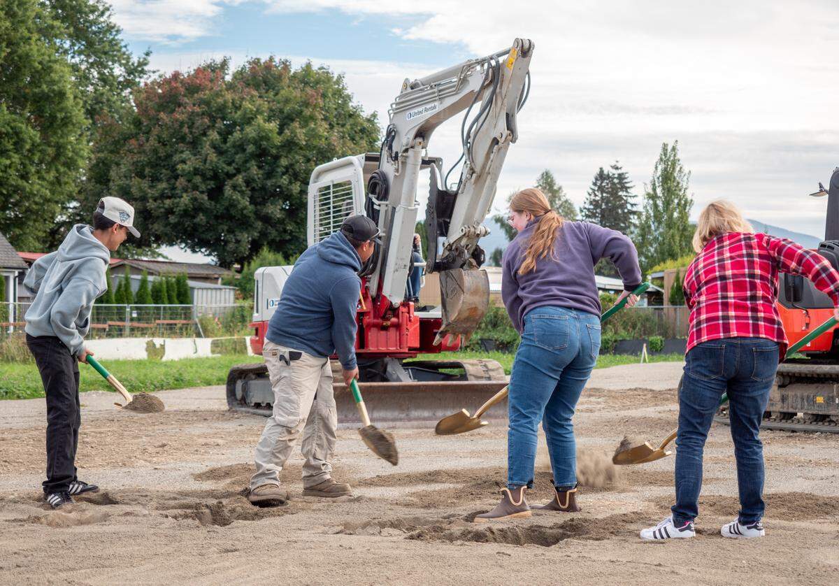 Community members participate in the groundbreaking ceremony of the Mateo Meadows affordable homeownership project on October 5, 2024, in Everson, Wash.