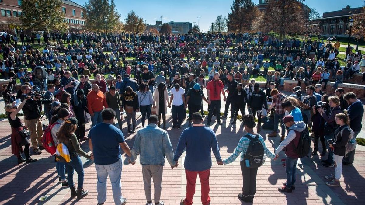 Protesters, students and media fill Traditions Plaza during a press conference following the Concerned Students 1950 protest Nov. 9, 2015, in Columbia, Mo.