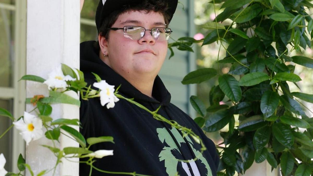 Gavin Grimm talks to reporters on his front porch during an interview at his home in Gloucester, Va. in August, 2015. A U.S. appeals court has overturned a policy barring a transgender student from using the boys’ restrooms at his Virginia high school. A three-judge panel of the 4th U.S. Circuit Court of Appeals ruled Tuesday, April 19, 2016 that the Gloucester County School Board policy is discriminatory. A federal judge had earlier rejected Grimm’s sex discrimination claim.