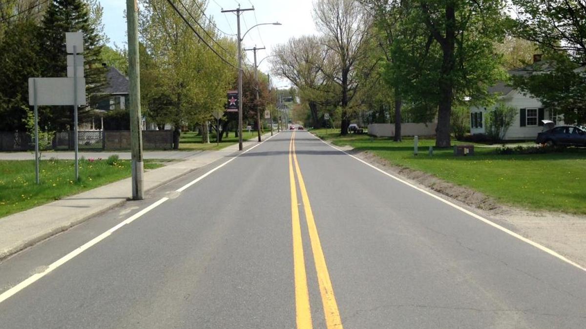 A 620-yard stretch of Highway 247 — called Canusa Street in Vermont and Rue Canusa in Quebec — is seen on May 21, 2016. On Canusa, the border runs east-west more or less right down the middle of the street. Drive on the north side going west and you are in Canada. Drive east and you are in the United States.