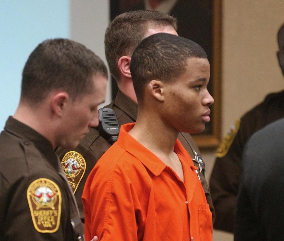 Lee Boyd Malvo listens to court proceedings during the trial of fellow sniper suspect John Allen Muhammad in Virginia Beach, Va., in 2003. The Supreme Court has agreed to consider Virginia’s plea to reinstate the life without parole sentence of a man who participated in sniper shootings that terrorized the Washington, D.C., region in 2002.