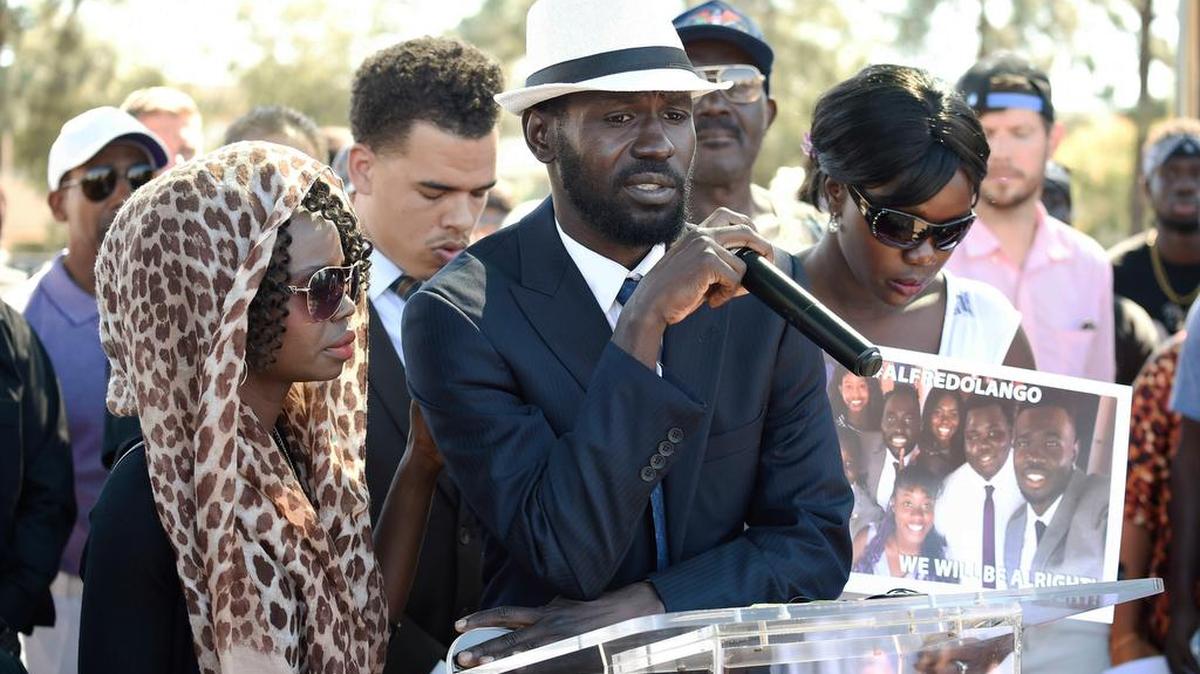 Apollo Olongo, center, brother of Alfred Olango, speaks Oct. 1 in reaction to his fatal shooting by an officer in El Cajon, Calif. The police department’s lone mental health expert was unavailable on Sept. 27, when Alfred Olango’s sister dialed 911 seeking help with her brother’s mental health crisis.