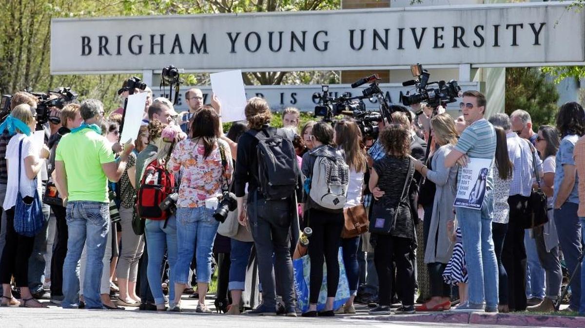 Protesters stand in solidarity with rape victims on the campus of Brigham Young University in April, 2016, during a sexual assault awareness demonstration, in Provo, Utah. Nationwide, more campuses are providing students with lessons in “bystander intervention,” a strategy that encourages everyone to step in and stop sexual assaults, ideally before they happen.