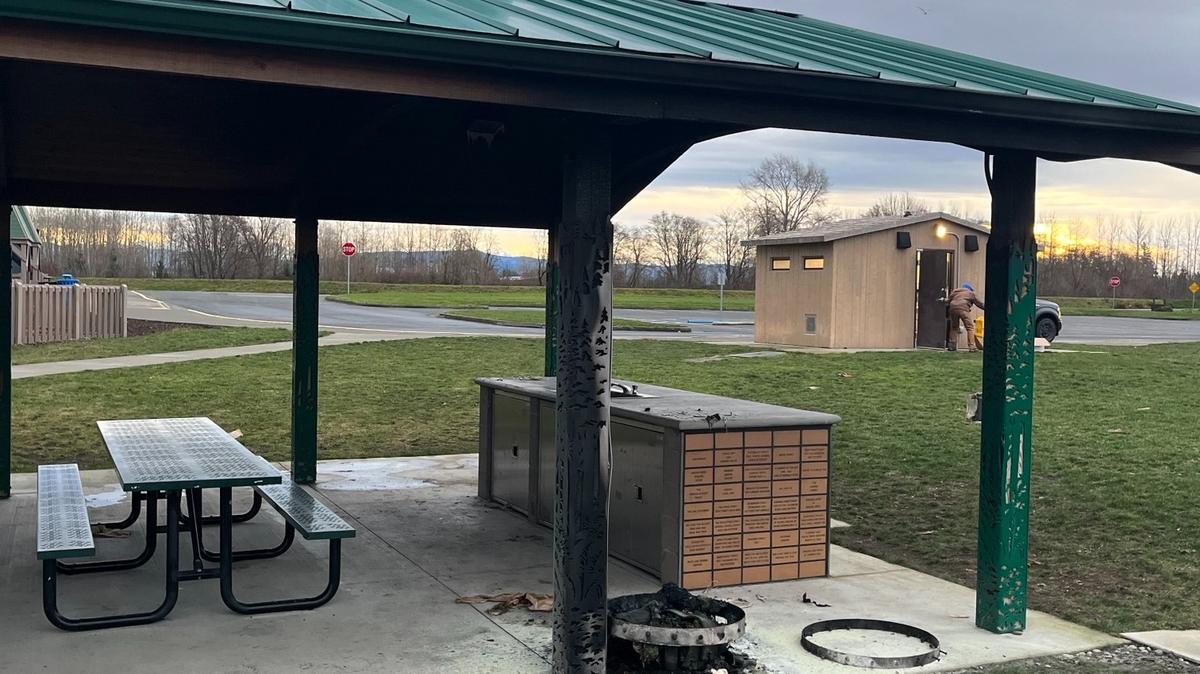 Whatcom County authorities are investigating a fire at a Ferndale park that left a shelter badly burned.