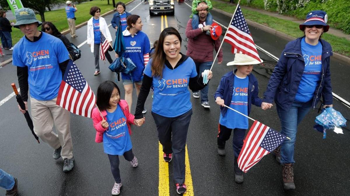 Christine Lui Chen, center, participates in the Bridgewater Memorial Day Parade in Bridgewater, N.J., on May 29. Chen hopes to become her district’s first Democratic state senator in more than 30 years and the first-ever Asian-American woman in her state’s legislature.