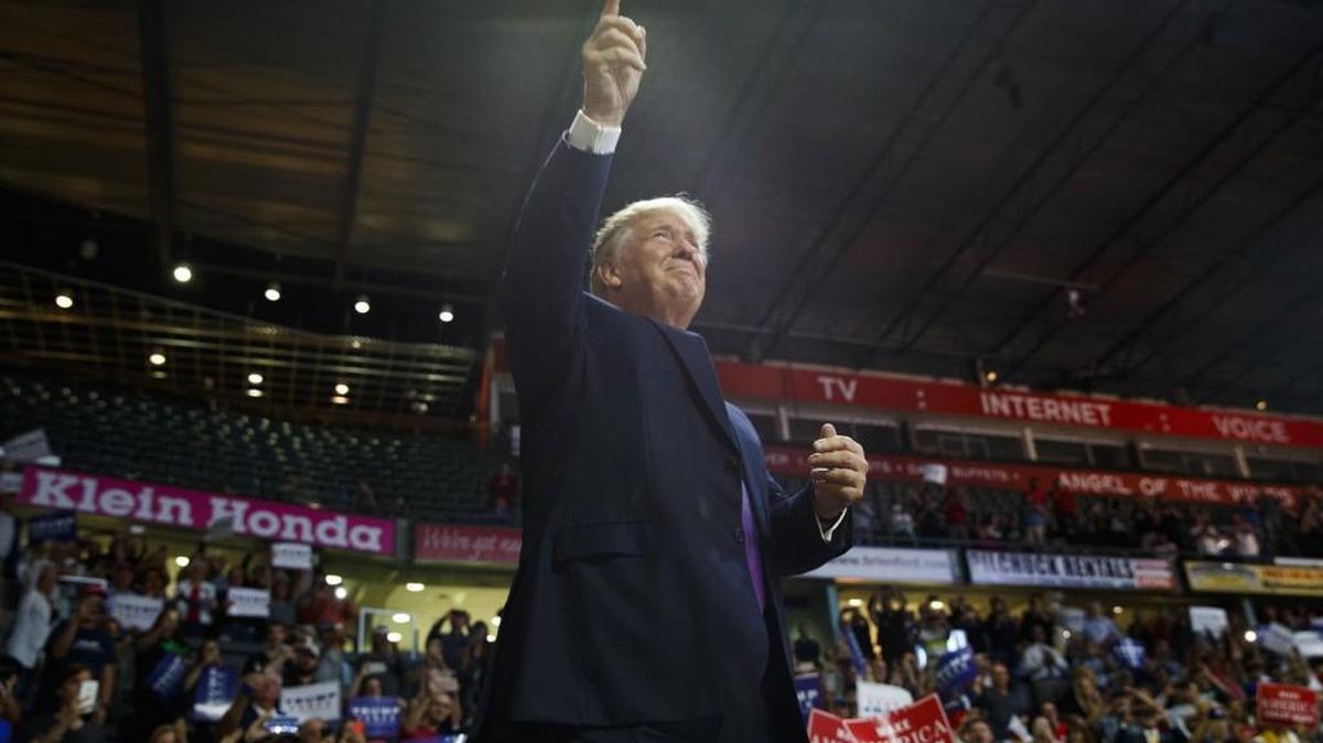 Republican presidential candidate Donald Trump arrives to a campaign rally Tuesday at Xfinity Arena in Everett.