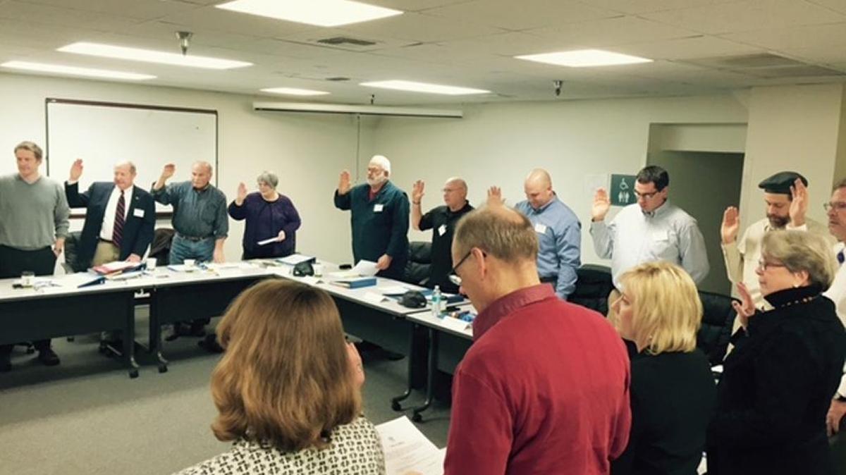 
Members of the Whatcom County Charter Review Commission are sworn in during their first meeting, on Jan. 12, 2015, in Bellingham.
