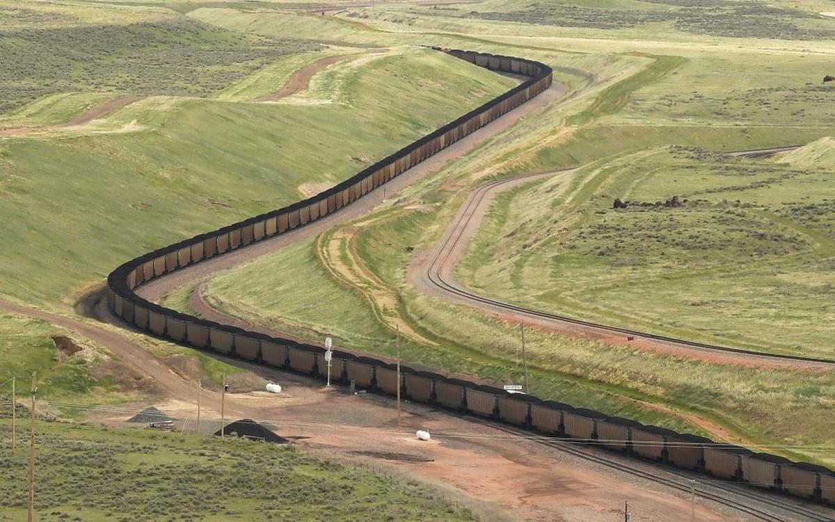 A train carrying cars full of coal cuts through Gillette, Wyoming, which calls itself “the energy capital of the nation.”