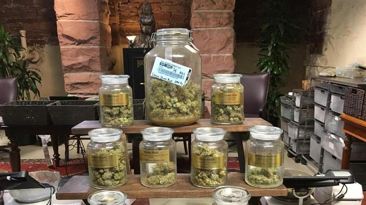 A variety of marijuana strains on display at a Denver dispensary. Despite its commercial availability in eight states, homegrown marijuana is thriving. Three states are limiting how many plants home growers can cultivate.