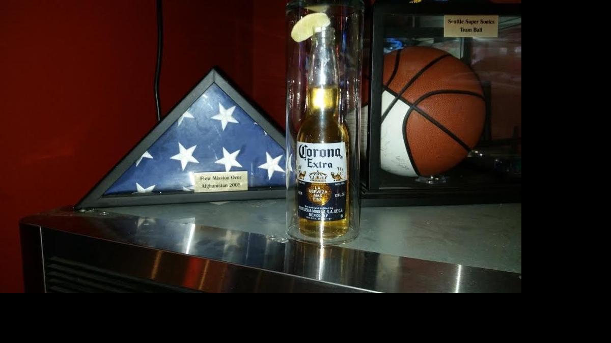 
An untouched Corona beer, purchased for a  fallen service member, has been  given a place of honor at Tacoma’s Buffalo Wild Wings.
