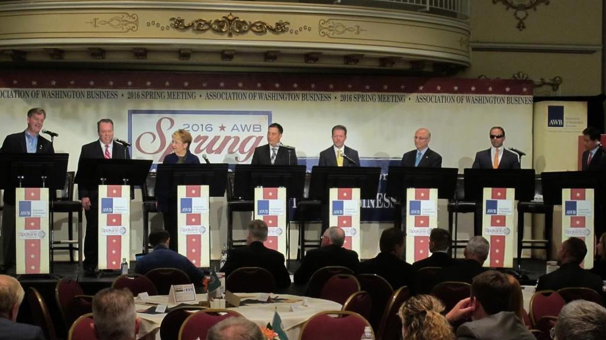 Eight of the 11 candidates for Washington lieutenant governor take part in a debate last month in Spokane. From left, Marty McClendon, Paul Addis, Sen. Karen Fraser, D-Olympia, Sen. Steve Hobbs, D-Lake Stevens, Bill Penor, Javier Figueroa, Sen. Cyrus Habib, D-Bellevue, and Phillip Yin, all stand at their podiums.