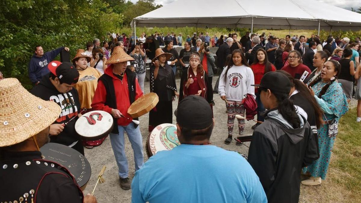 The Nisqually Canoe Family offers music and song at the conclusion of Tuesday’s celebration honoring the renaming of Nisqually National Wildlife Refuge as the Billy Frank Jr. Nisqually National Wildlife Refuge.