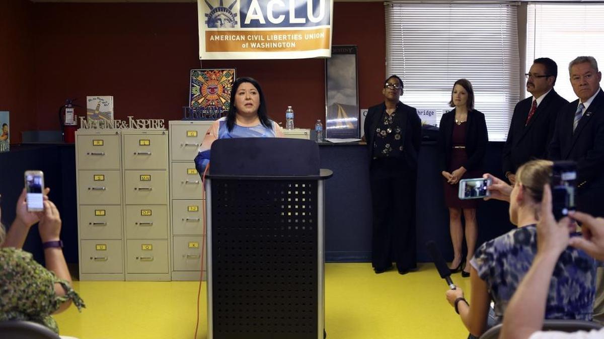 Bertha Aranda Glatt speaks Thursday during a press conference announcing the ACLU has filed a lawsuit against the city of Pasco.