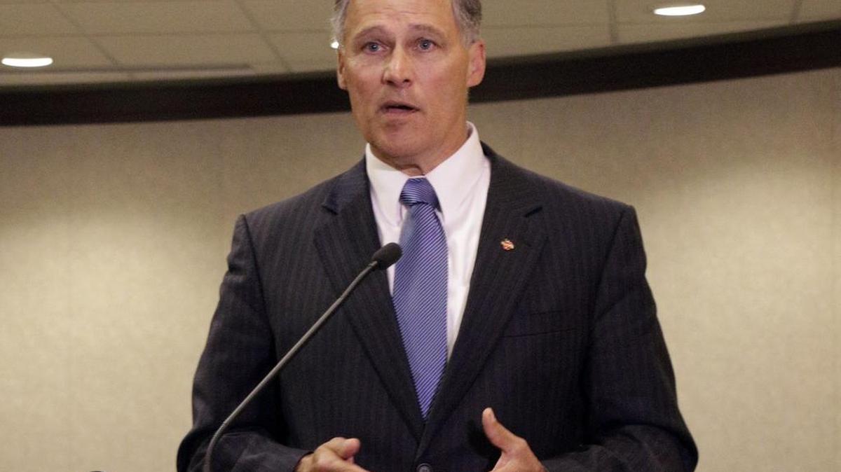 
Gov. Jay Inslee talks to the media Monday in SeaTac following a meeting with legislative leaders about recent sanctions by the state Supreme Court. The state is being fined $100,000 a day, to be put in a special education account, for its lack of progress on a plan to full fund basic education. 

