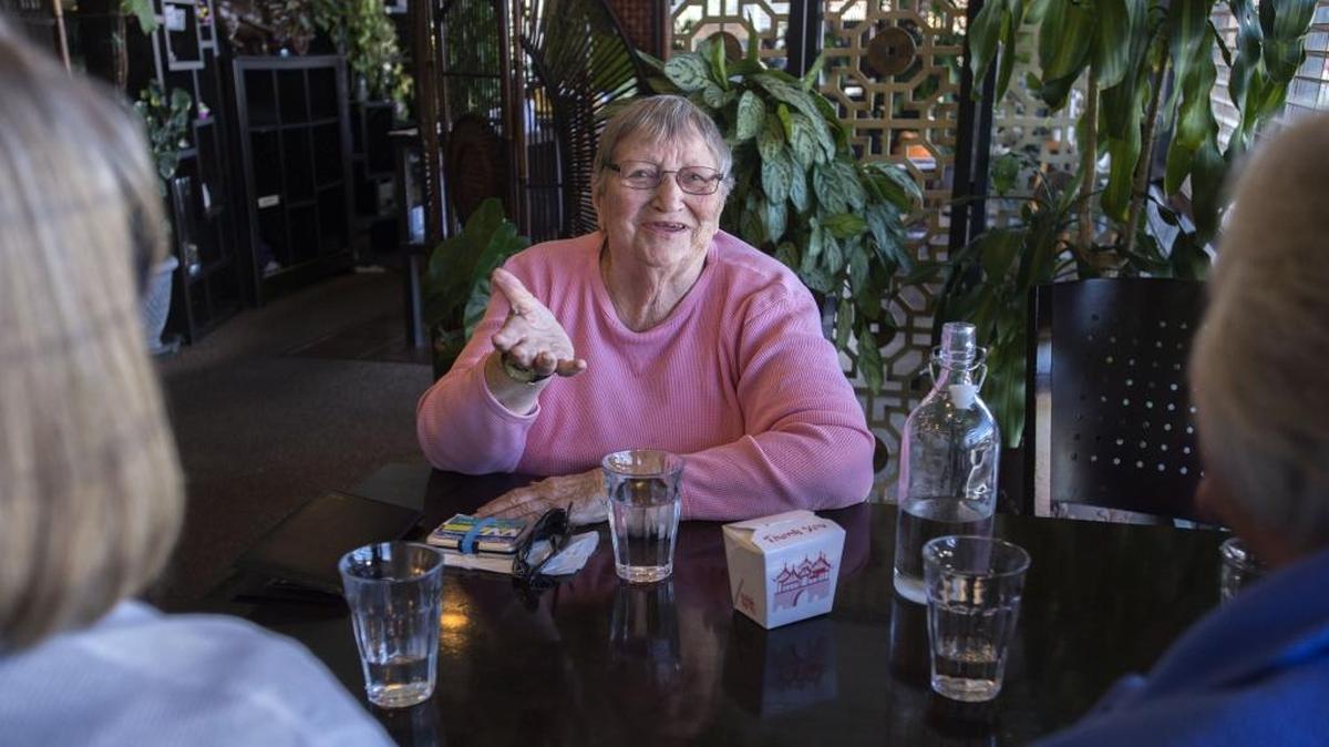 Wanda Riley, 85, enjoys her monthly lunch with her friends last month at the Thai Garden Restaurant in Olympia. Riley retired from a state government job and says that without a state subsidy she and other retirees receive to help pay for her health- insurance premiums, she would have to cut back on expenses, such as going out to eat.