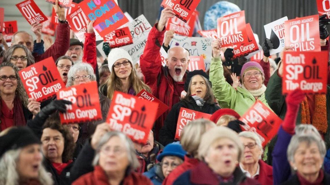 People attend a public hearing on a proposed massive oil-handling facility in southwest Washington, Tuesday, Jan. 5, 2016, in Ridgefield, Wash. Tesoro Corp. and Savage Cos., operating as Vancouver Energy, want to build a rail-to-marine oil transfer terminal along the Columbia River that can handle an average 360,000 barrels of crude per day.