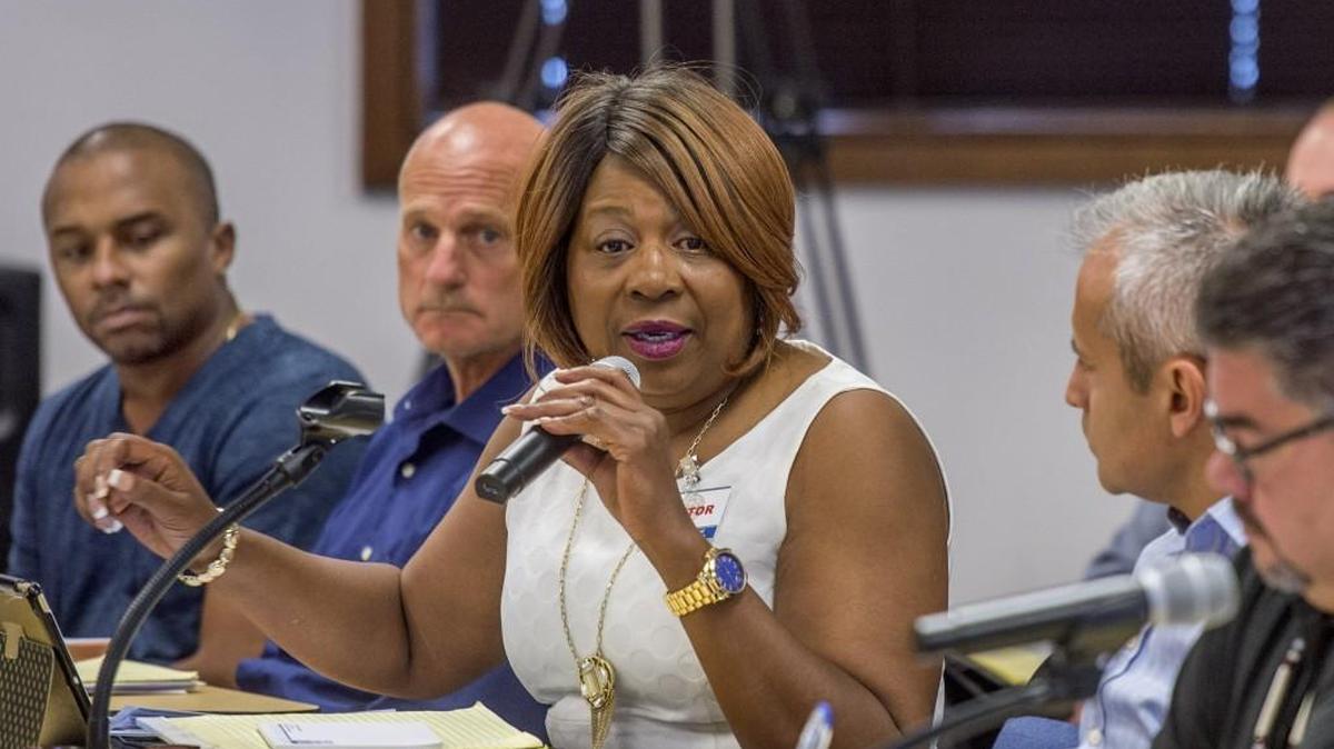 Karen Johnson of the Black Alliance of Thurston County addresses the legislative task force on Use of Deadly Force in Community Policing during a meeting at the state Criminal Justice Training Center in Burien, on July 26. Johnson is backing a proposal that would go beyond the task force’s recommendations in altering state law on the use of deadly force by police.