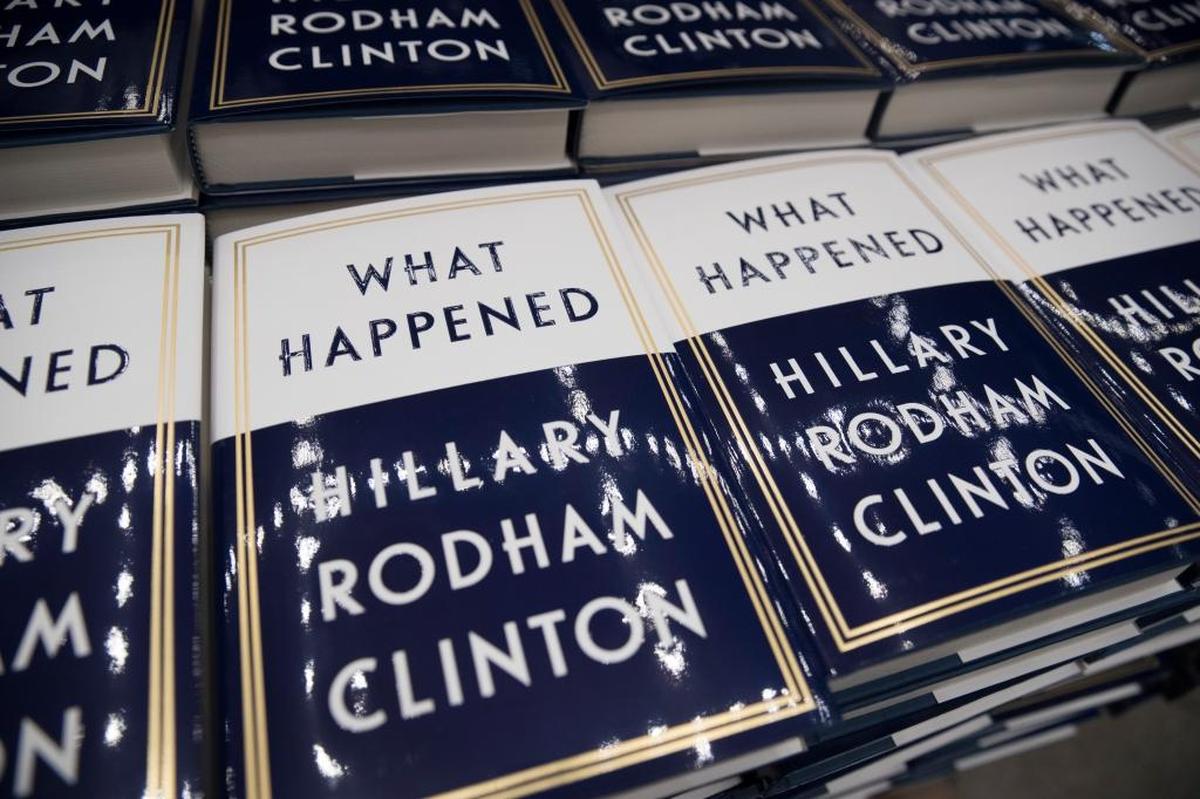 A box of Hillary Clinton’s book “What Happened” are staged to be distributed outside the Warner Theatre in Washington in September. Clinton appeared at the Paramount Theater in Seattle Monday night.