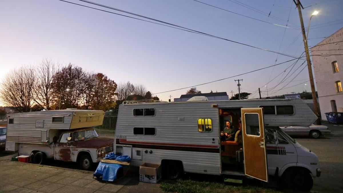 Homeless people park just north of Boeing Field, the King County International Airport. In Seattle, about one-third of unsheltered homeless people live in vehicles, according to recent homeless counts. A King County Superior Court judge ruled Friday that the city’s impoundment of one homeless man’s truck violated the state’s homestead act – a frontier-era law that protects properties from forced sale – because he was using it as a home.