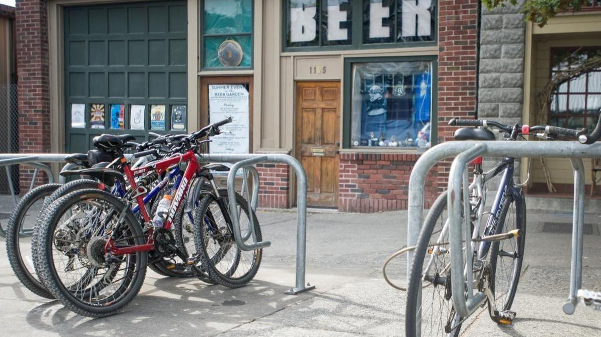 Bicycles sit chained to a bicycle rack in front of Boundary Bay Brewery on Wednesday, Aug. 10, 2016 in Bellingham.
