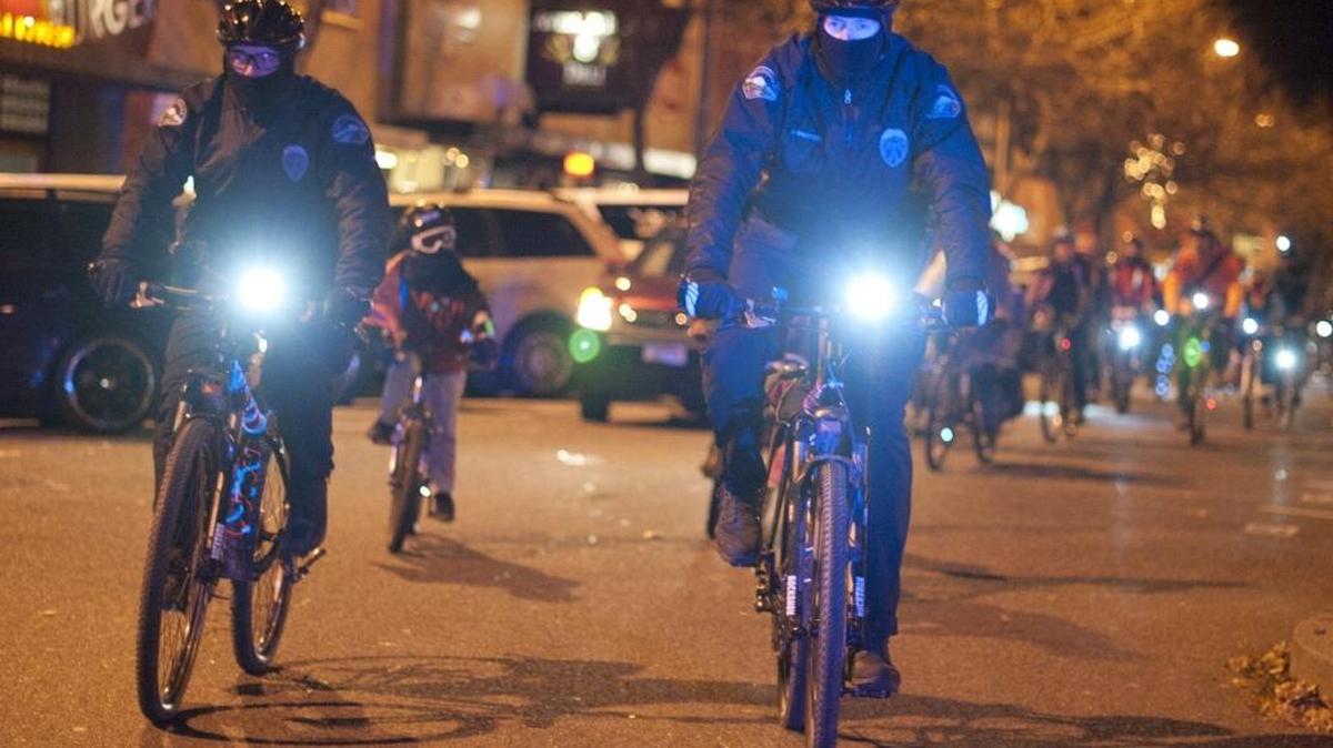 When riding at night bikes need a headlight, visible for at least 500 feet, and a red rear reflector, visible for at least 600 feet.