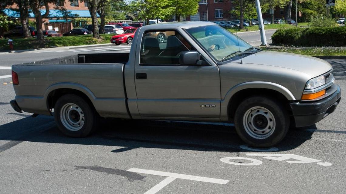 A truck travels through a bicycle lane while turning from Elm Street to Broadway Street on April 20, 2016 in Bellingham. It’s illegal to drive in a bike lane except in certain cases, such as making a right turn across one, though any such move should be done with caution.