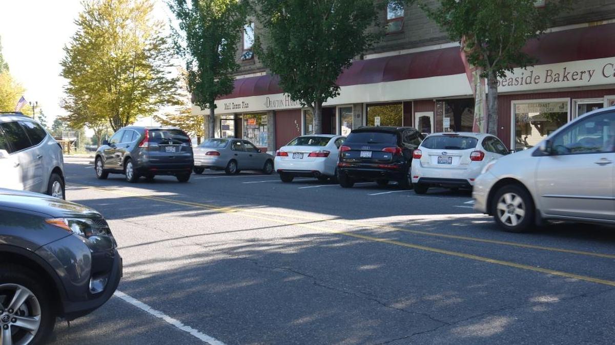 When a u-turn is legal, parking in an angled spot on the other side of the road is legal, but driver should also use caution to prevent an accident.