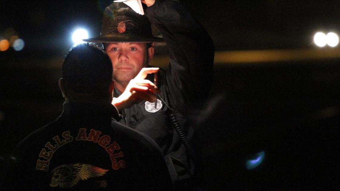 Washington State Patrol Trooper Guy Gill performs a field sobriety test on the side of Interstate 5 during the Night of 1,000 Stars DUI emphasis patrol in 2012.