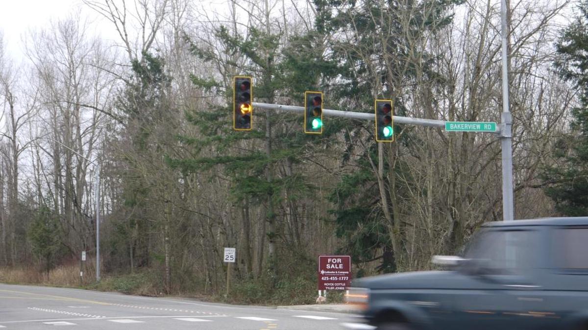 Unlike a solid yellow light, which warns that a red light is coming, the flashing yellow, such as this one on Bakerview Road, reminds drivers to be careful going through an intersection.
