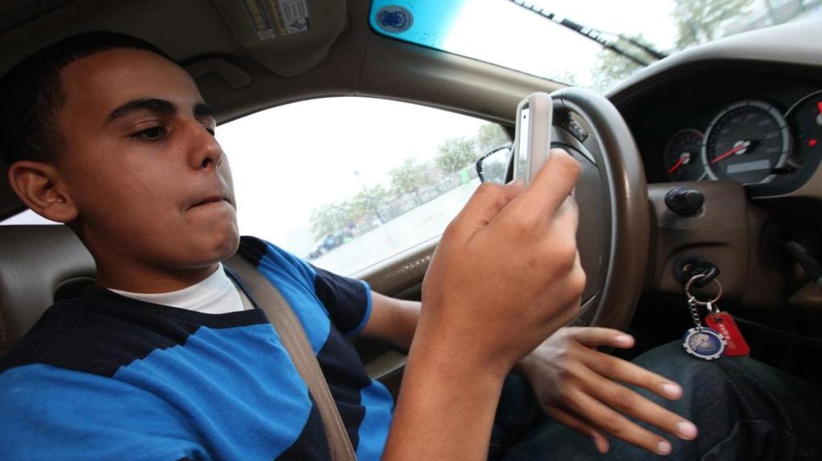 Borhan Muthana, 16, takes the Allstate Safe Driving Challenge in Detroit, Mich., on Aug. 27, 2012, at Comerica Park. Muthana attempts to text while driving on a closed course. Recent studies have shown texting while driving is as dangerous as being drunk behind the wheel.