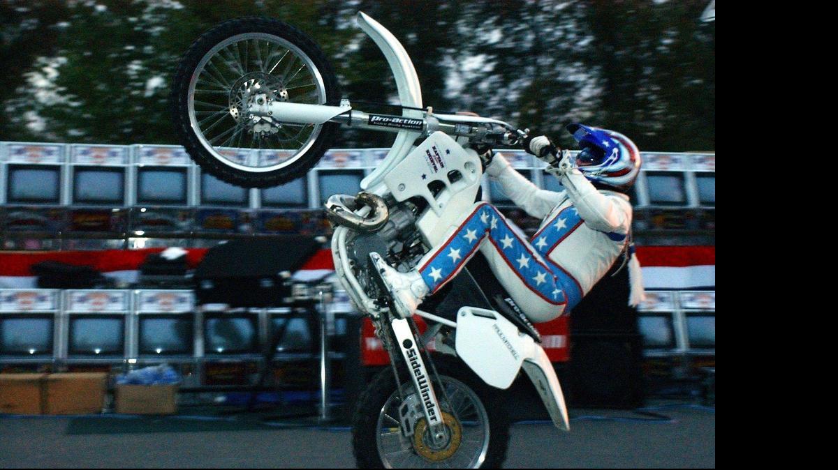 
Popping a wheelie is fine if you’ve just jumped 200 slot machines outside Nooksack River Casino in Deming, as Robbie Knievel did in this 2004 photo. But if you’re on a city, county or state road, a wheelie could be considered negligent driving and get you a $250 ticket.
