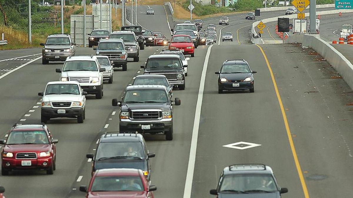 
When driving in the carpool lane, such as here at the South 19th Street overpass over Highway 16 near Tacoma, cars looking to pass you should move to the right and use the “fast” lane.
