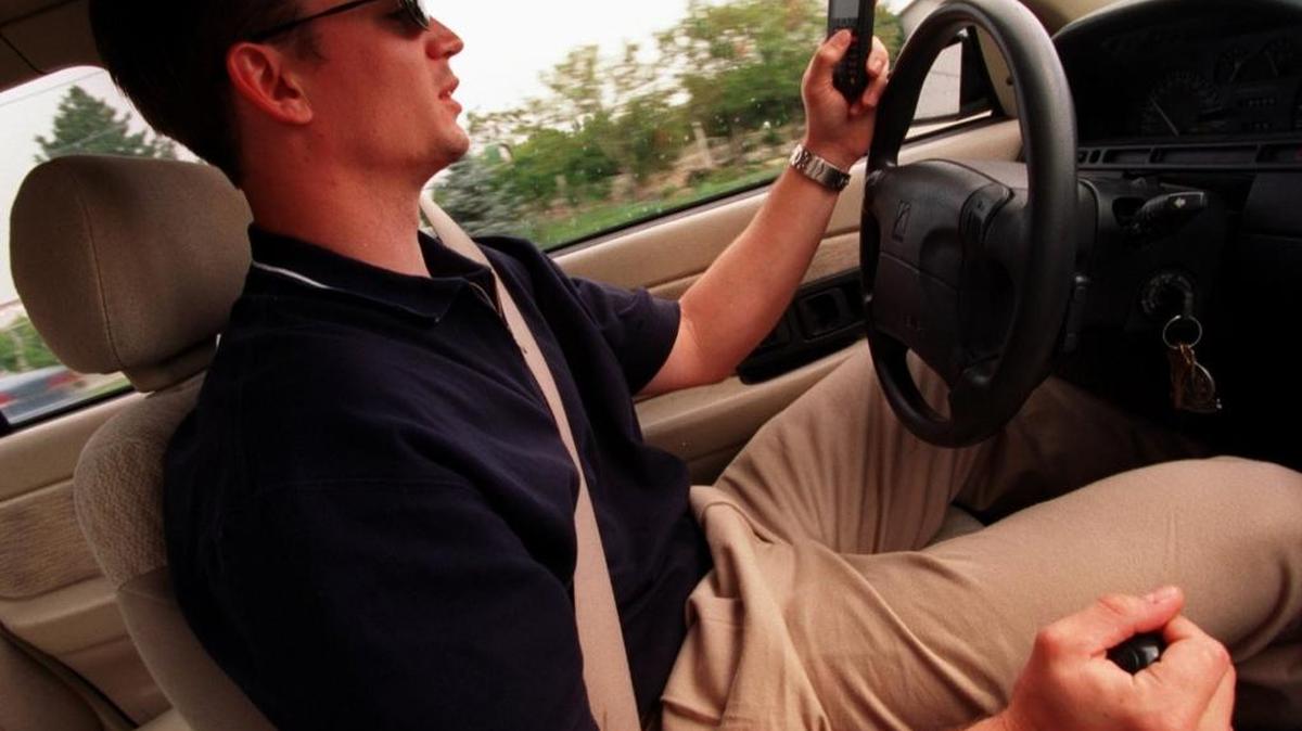 Mark Riggs tries to handle steering, shifting and watching the road -- all while talking on his cell phone cellphone. While promoting safety is the most important reason for companies to enact policies against distracted driving, if an employee crashes while driving a company vehicle or using a company phone or driving a personal vehicle and using a personal phone for company concerns, the employer can be held liable.