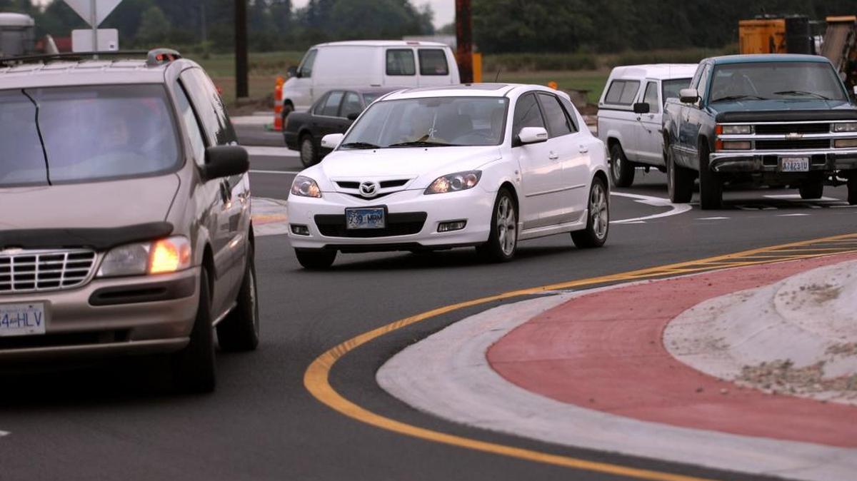 Southbound traffic flows around the roundabout at Guide Meridian and Ten Mile roads. Roundabouts are becoming more common around Whatcom County and Washington state.