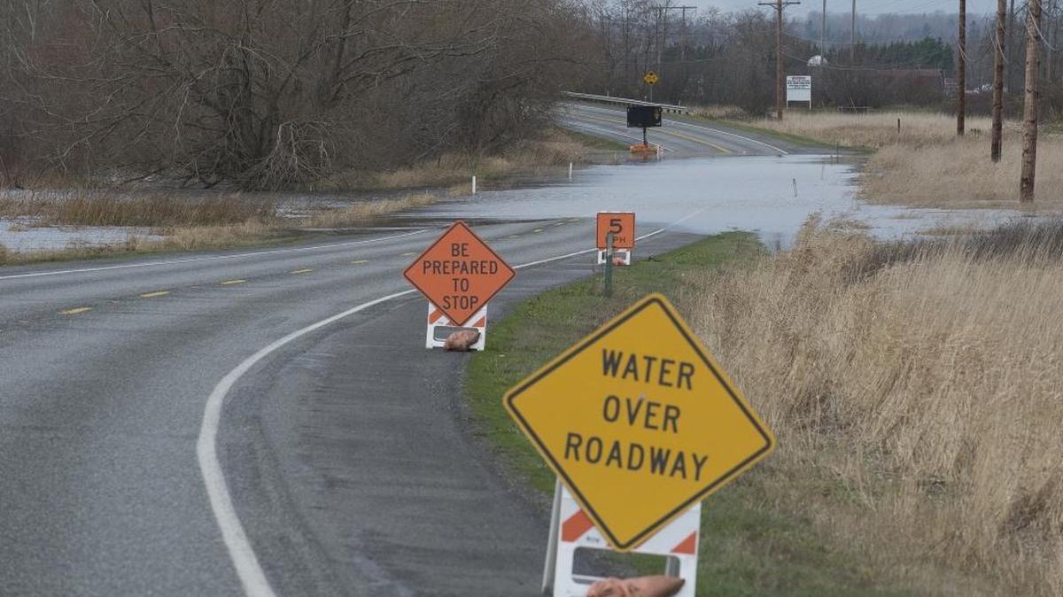 Flood water covers a portion of Slater Road on Friday, Nov. 24, in Ferndale. This time of year it’s not uncommon to encounter flooded roads, so it’s a good idea to pay attention to signs warning of water over the road.
