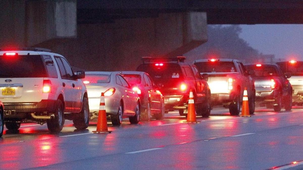 Brake lights, as seen in this traffic jam in Raleigh, N.C., on Jan. 14, 2015, can vary in intensity by appearance. Washington state follows federal regulations that limit how bright they can be.