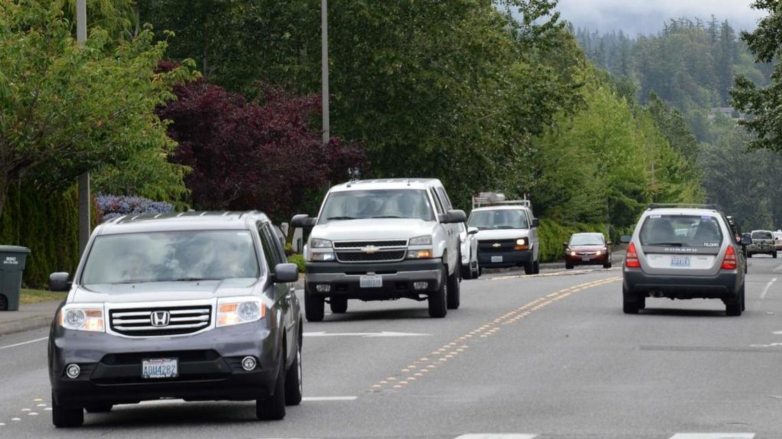 Cars turn at Barkley Boulevard and Orleans Street in Bellingham May 19, 2016. Drivers can’t use the center lane for a long distance, even if they plan to make a left turn ahead.