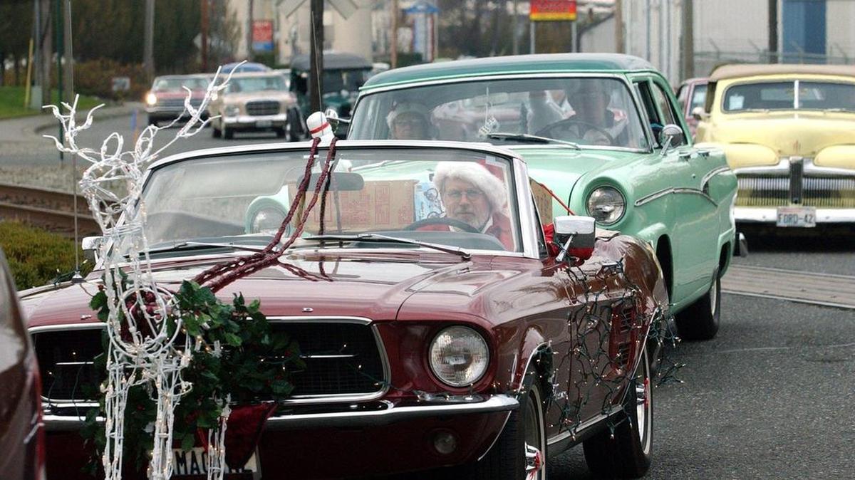 
While participants in a Project Santa classic car parade in Whatcom County in 2003 could get away with a reindeer strapped to the front of their Ford Mustang, in regular driving it is illegal to have something obscuring your license plate.
