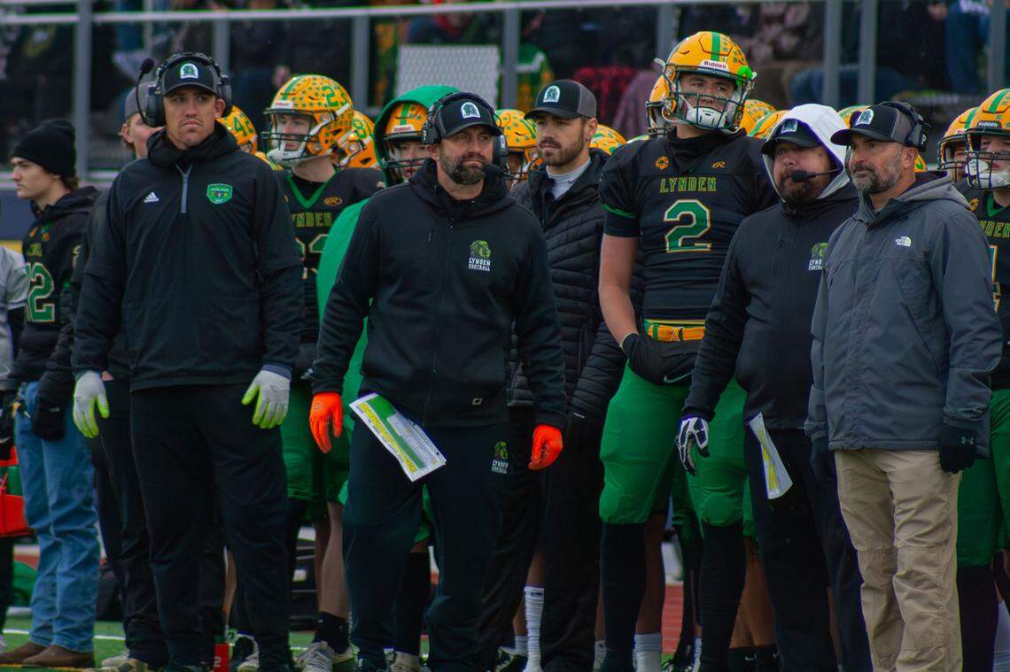 Lynden coaches and players look on from the sideline Saturday.