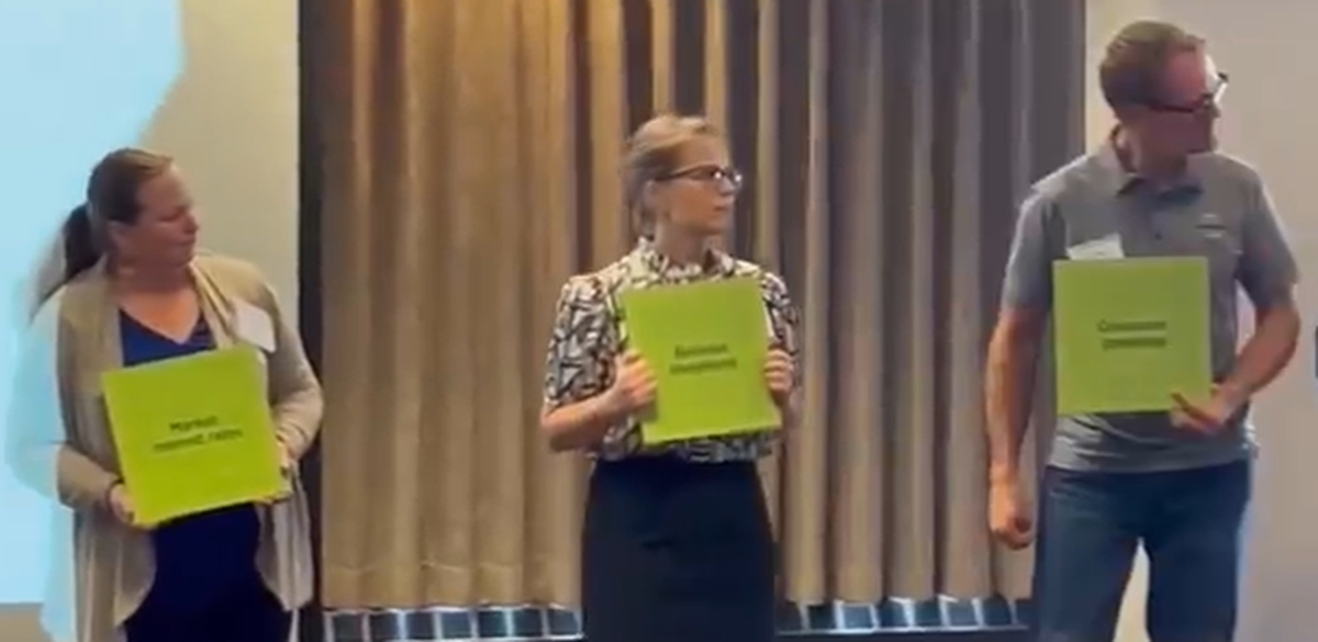 Teachers participate in a workshop at Western Washington University’s 2024 economics symposium.