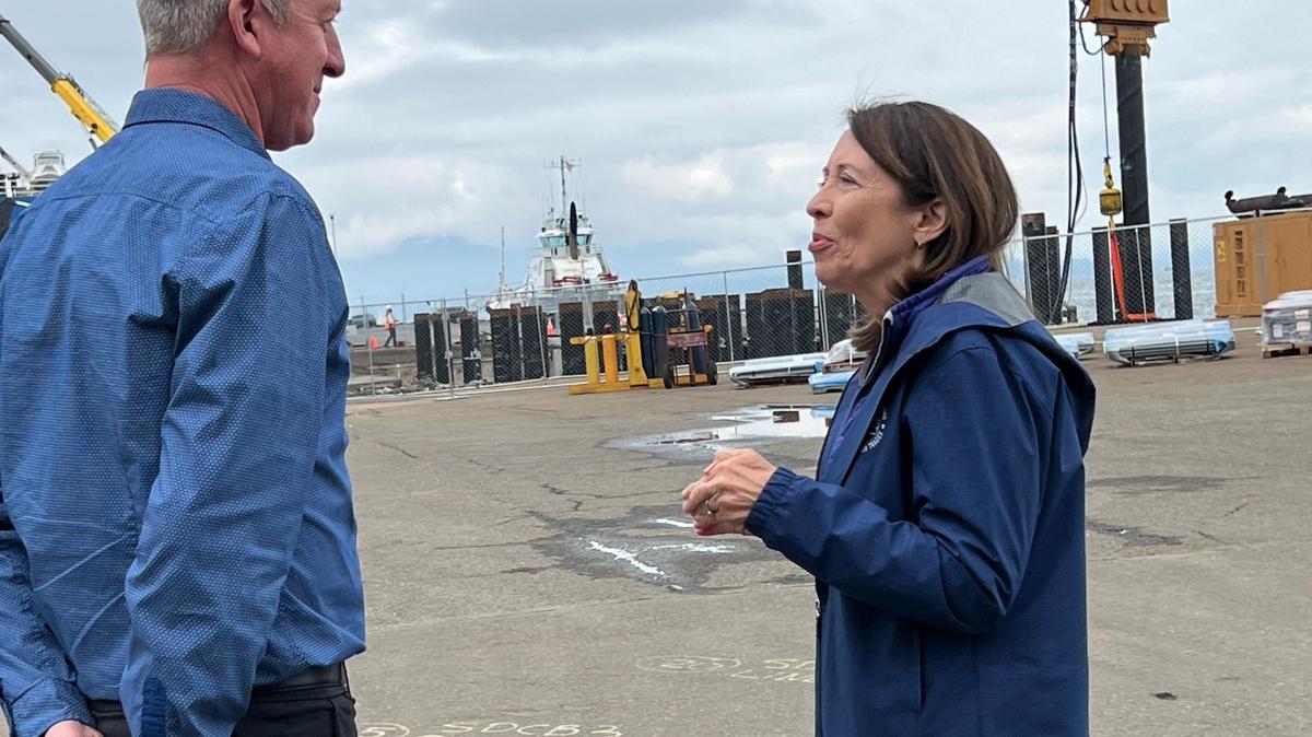 U.S. Sen. Maria Cantwell, D-Wash., right, talks to Port of Bellingham spokesman Mike Hogan, left, during a tour of port facilities on Wednesday.